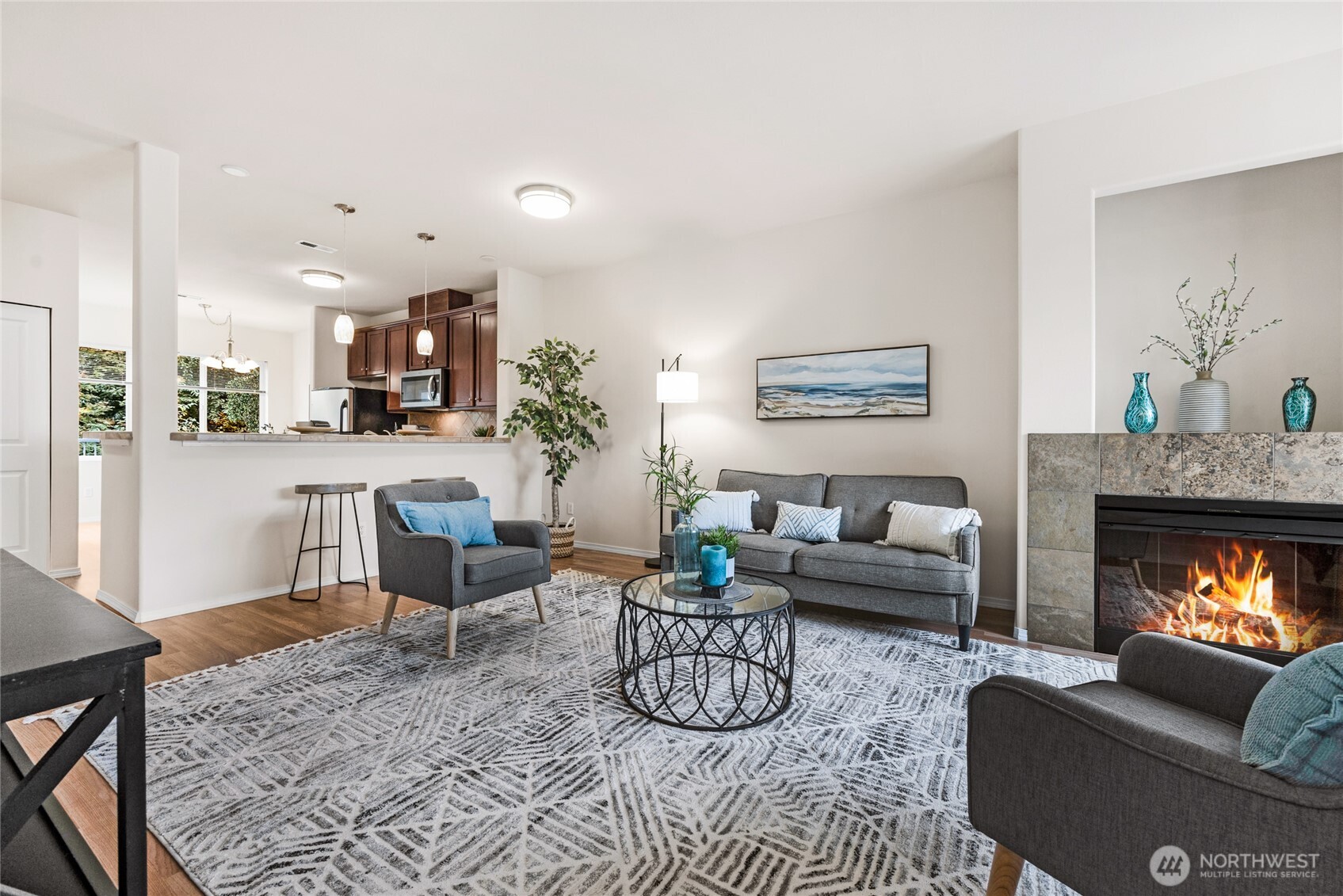 14915 38th Drive Southeast, Unit JJ1180 Bothell, WA 98012 - Photo 8 of 38 a living room with furniture and a fireplace