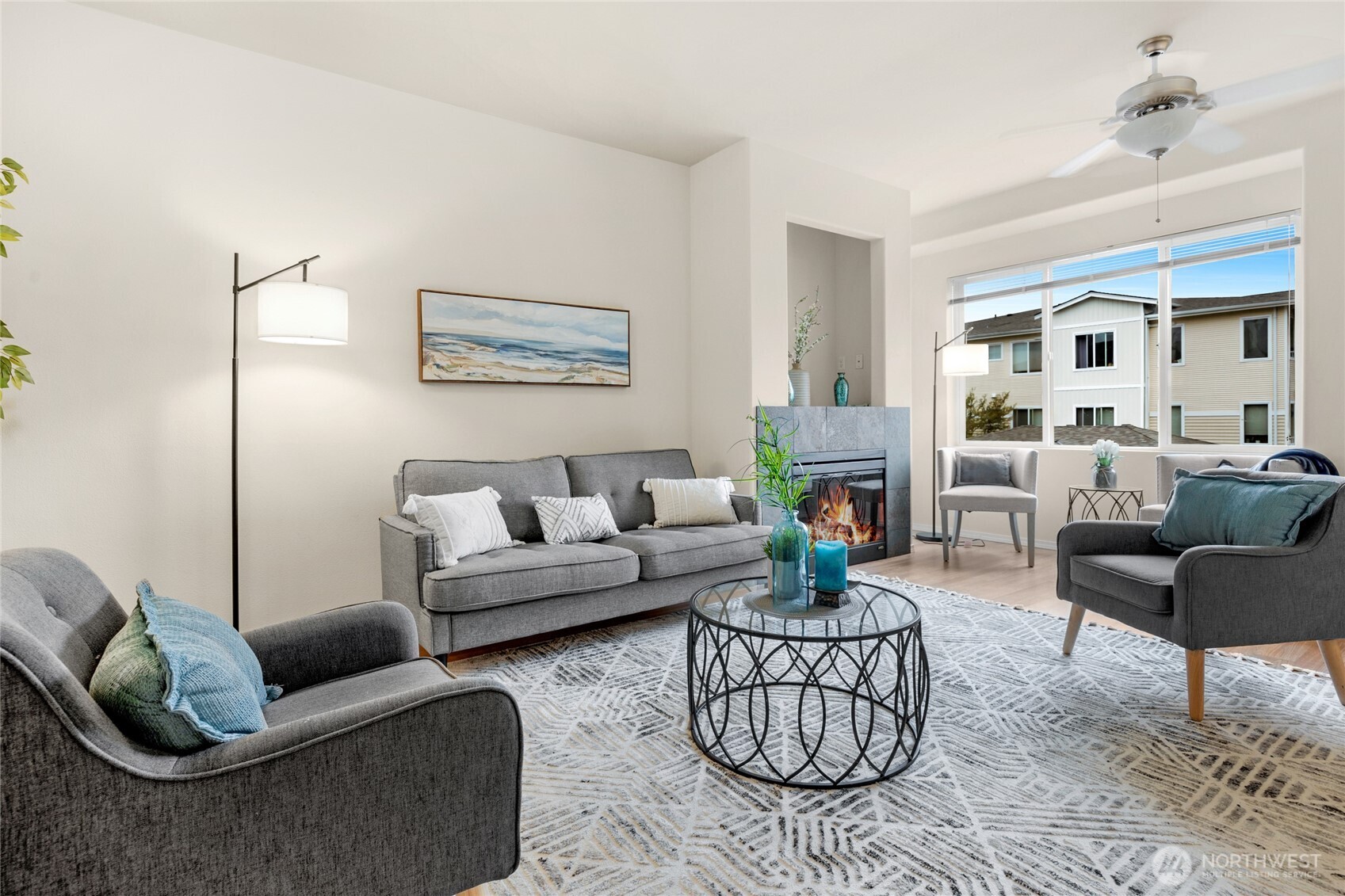 14915 38th Drive Southeast, Unit JJ1180 Bothell, WA 98012 - Photo 9 of 38 a living room with furniture or couch and a fireplace