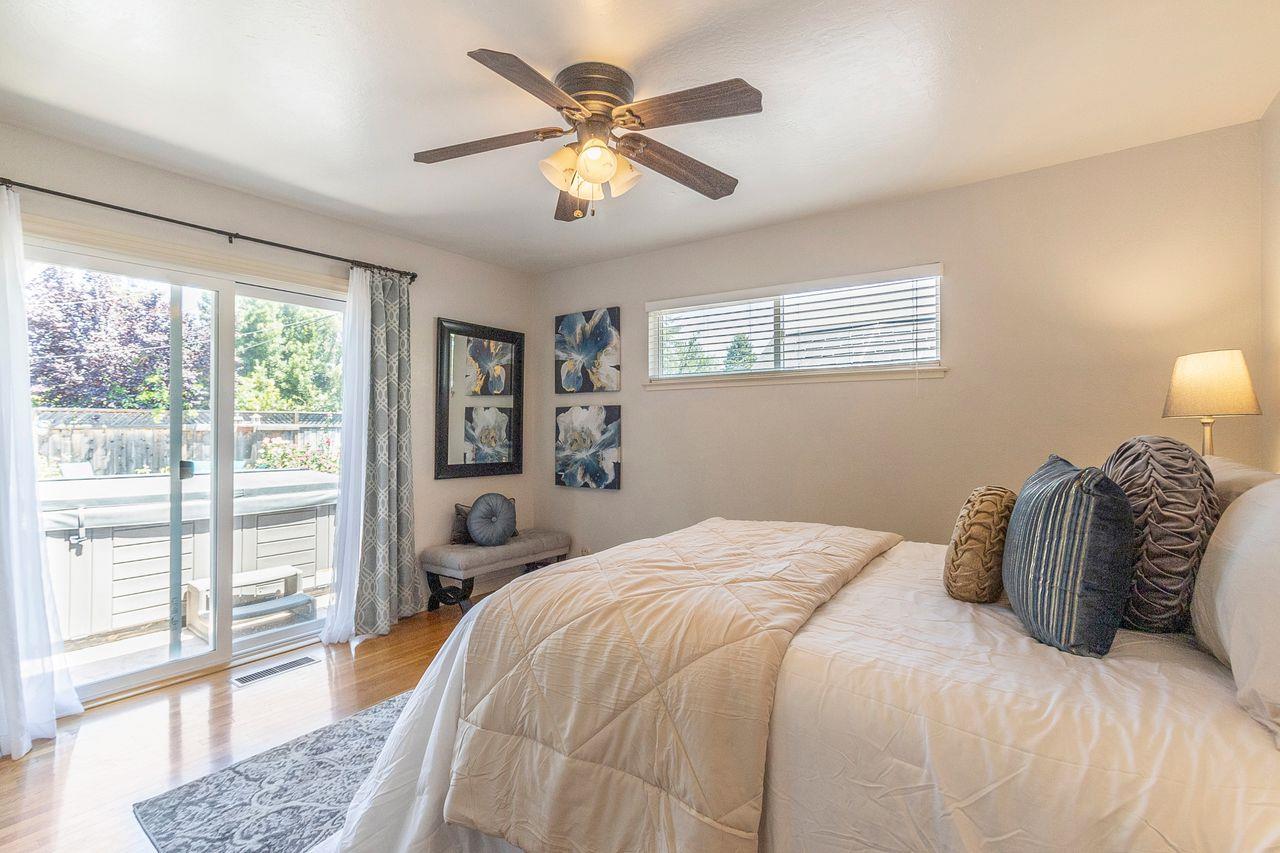 616 Sobrato Drive Campbell, CA 95008 - Photo 19 of 27 a bedroom with a large bed and a large window