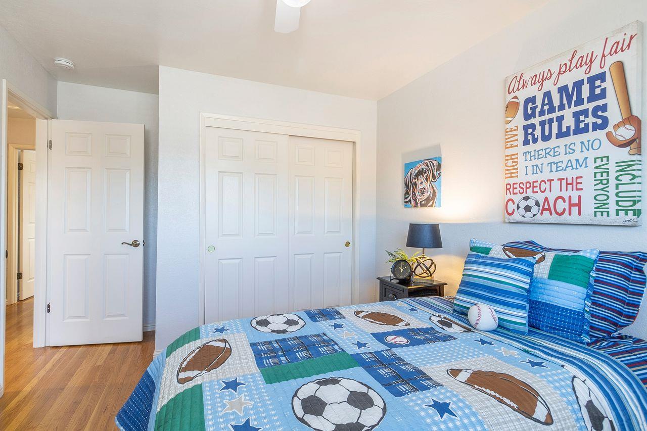 616 Sobrato Drive Campbell, CA 95008 - Photo 23 of 27 a bedroom with furniture and a lamp