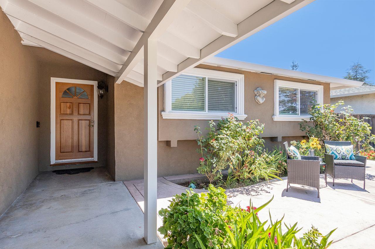 616 Sobrato Drive Campbell, CA 95008 - Photo 4 of 27 a front view of a house with a yard