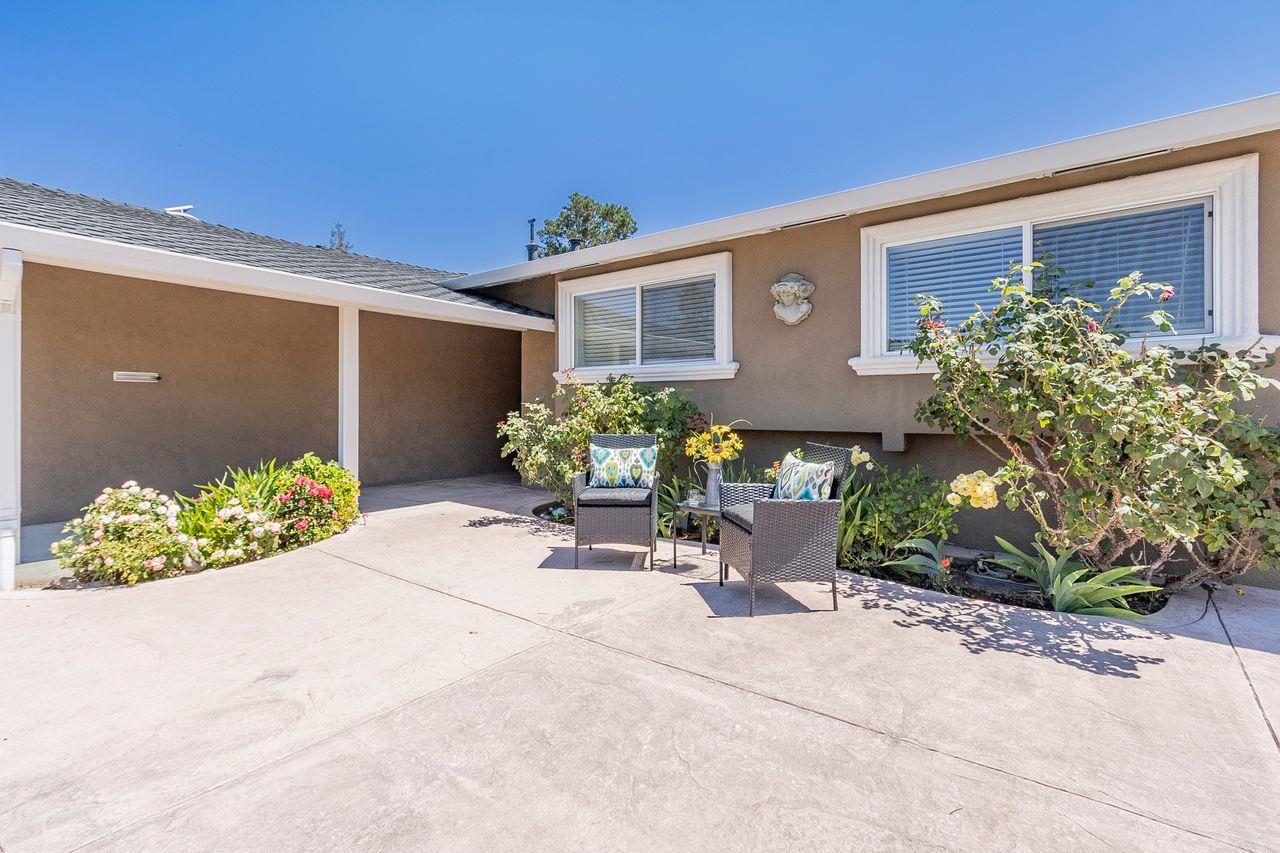616 Sobrato Drive Campbell, CA 95008 - Photo 5 of 27 a potted plant sitting in front of a house
