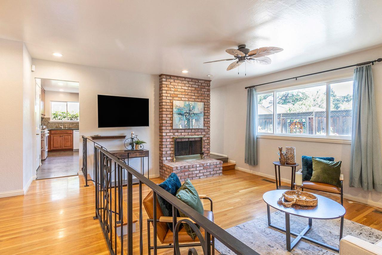 616 Sobrato Drive Campbell, CA 95008 - Photo 7 of 27 a living room with furniture and a flat screen tv