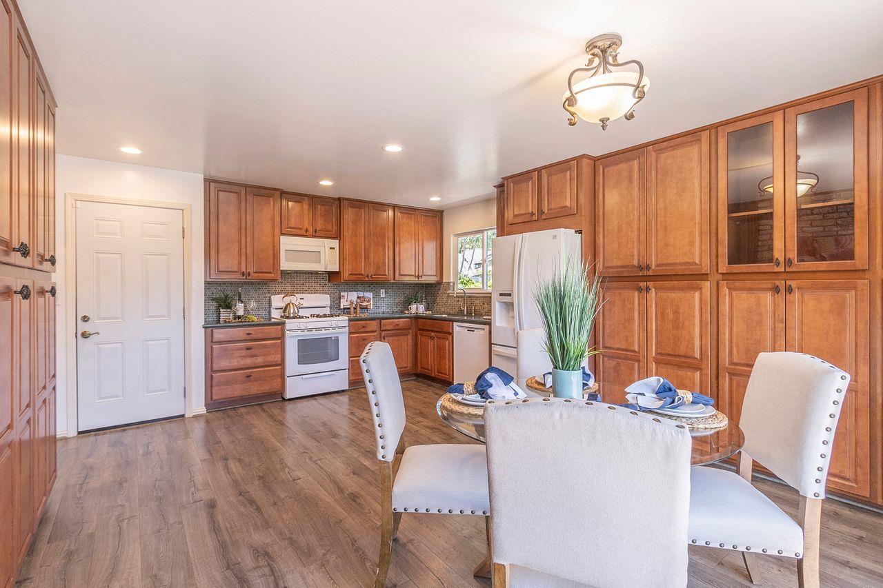 616 Sobrato Drive Campbell, CA 95008 - Photo 10 of 27 a living room with stainless steel appliances kitchen island granite countertop furniture and a view of kitchen