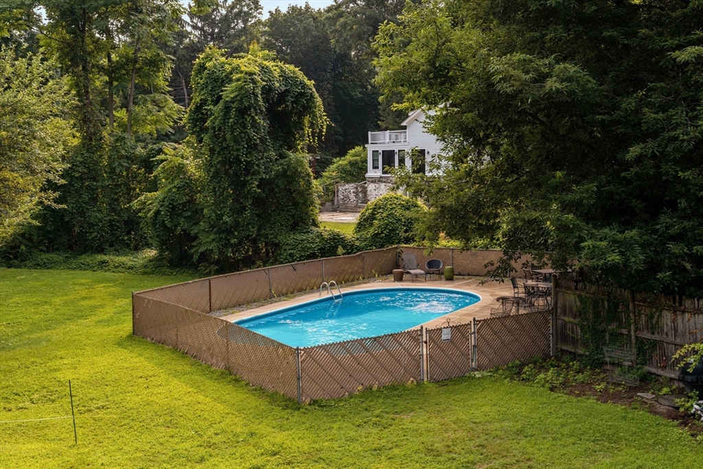 16 Blake Road Brookline, MA 02445 - Photo 11 of 12 a view of a swimming pool with a yard