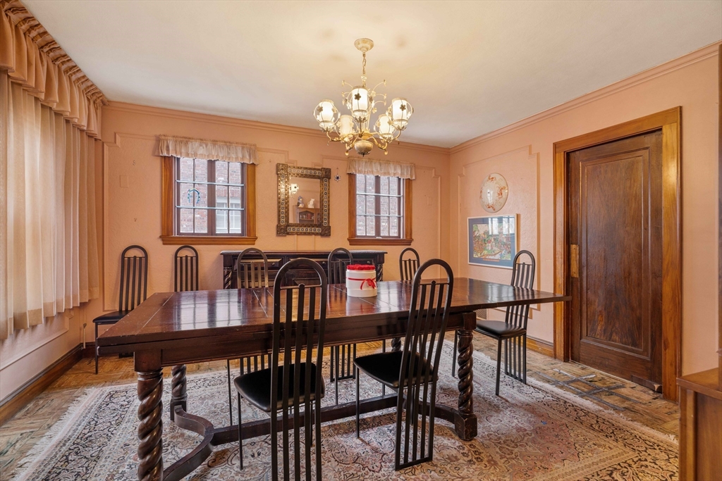 16 Blake Road Brookline, MA 02445 - Photo 4 of 12 a view of a a dining room with furniture window and wooden floor