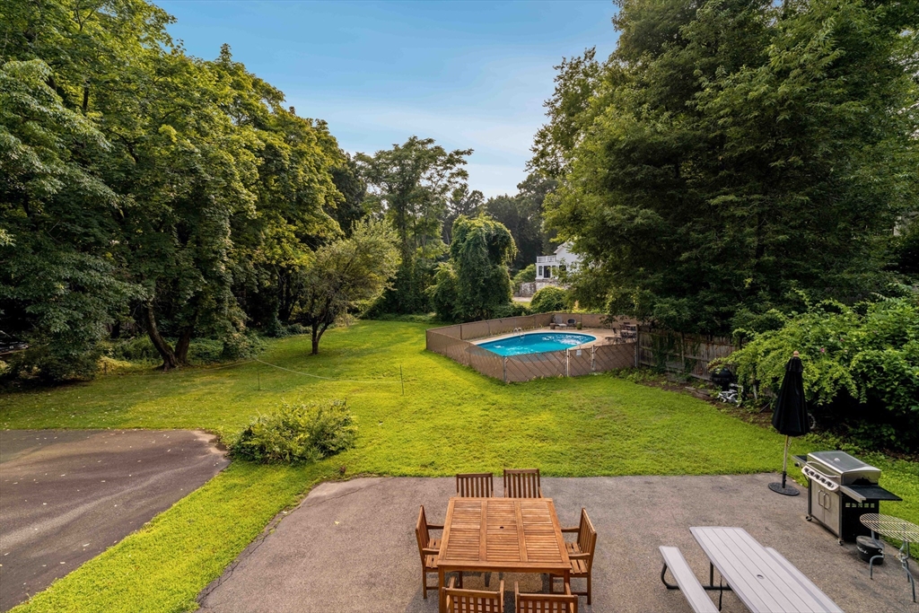 16 Blake Road Brookline, MA 02445 - Photo 10 of 12 a view of a backyard with swimming pool