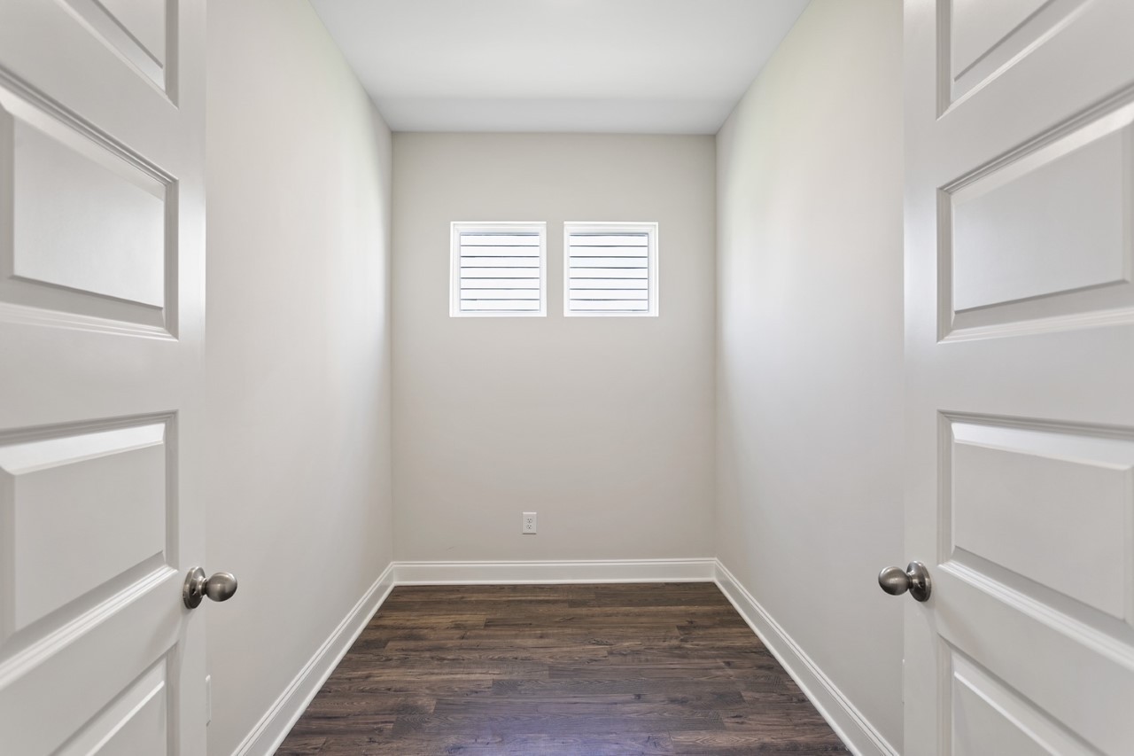 1108 Riverview Run Madison, TN 37115 - Photo 11 of 23 a view of a room with a wooden floor and a window