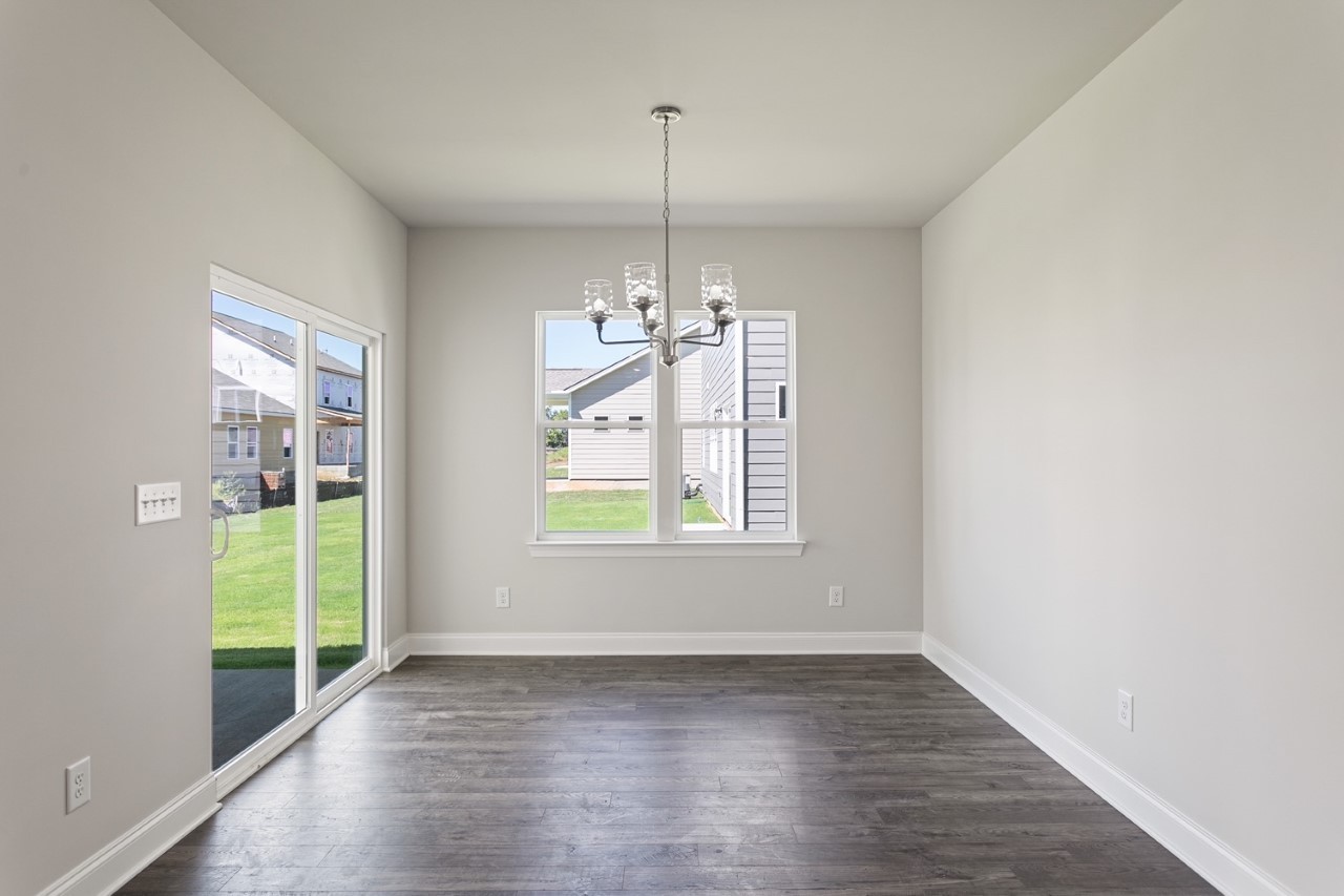 1108 Riverview Run Madison, TN 37115 - Photo 8 of 23 a view of a room with window wooden floor and front door