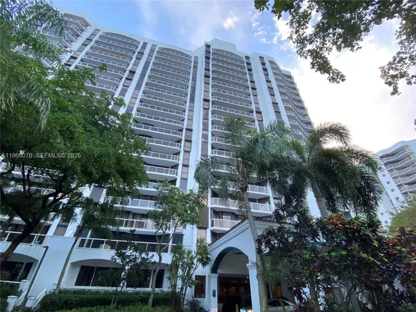 a front view of a multi story residential apartment buildings