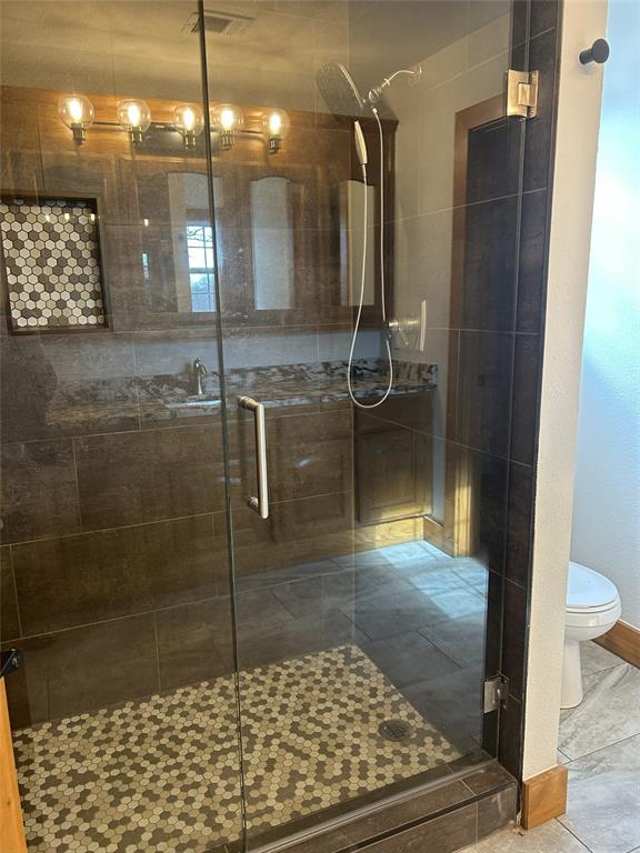 307 County Road 4790 Boyd, TX 76023 - Photo 13 of 25 a bathroom with a shower