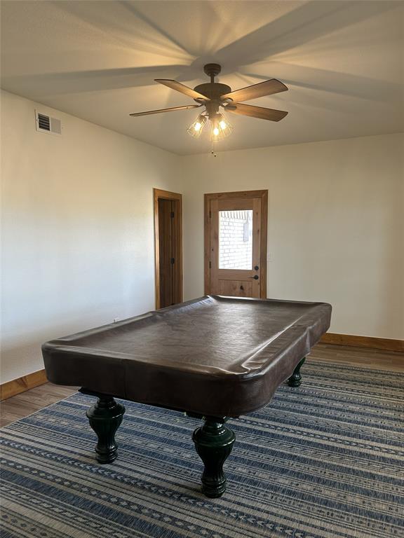 307 County Road 4790 Boyd, TX 76023 - Photo 9 of 25 a room with pool table and windows