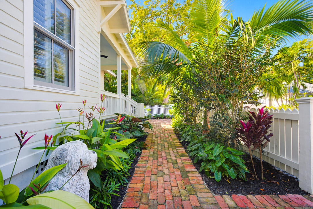 1230 South Street Key West, FL 33040 - Photo 13 of 60 a view of a pathway along with potted plants