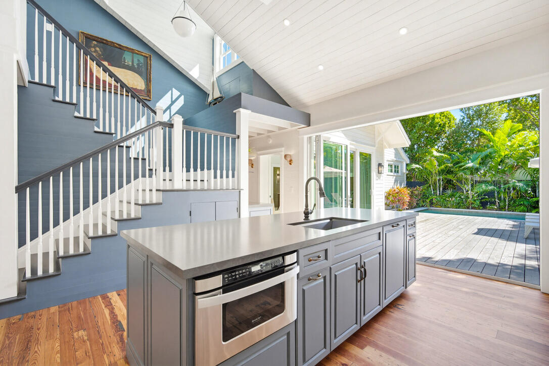 1230 South Street Key West, FL 33040 - Photo 23 of 60 a kitchen with sink and stove