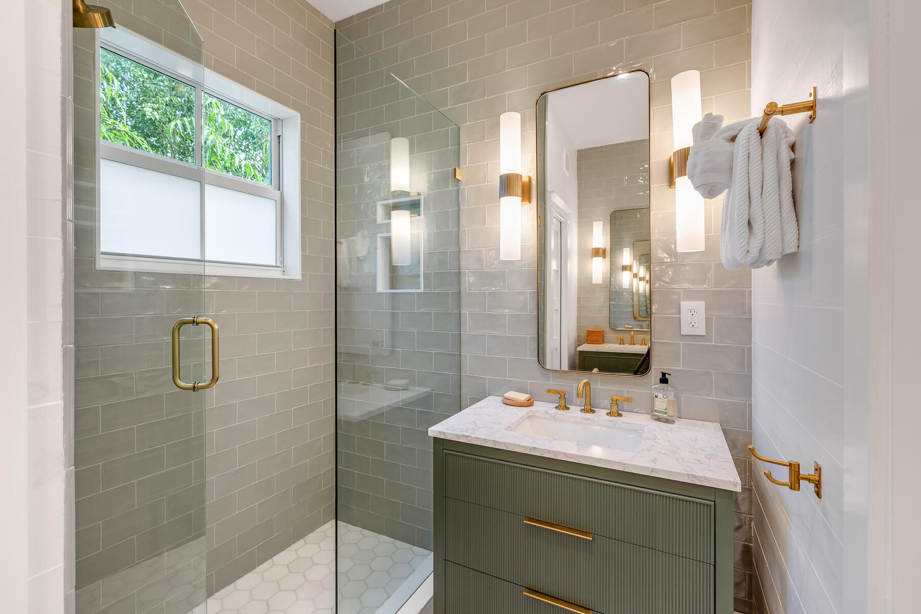 1230 South Street Key West, FL 33040 - Photo 33 of 60 a bathroom with a sink and mirror