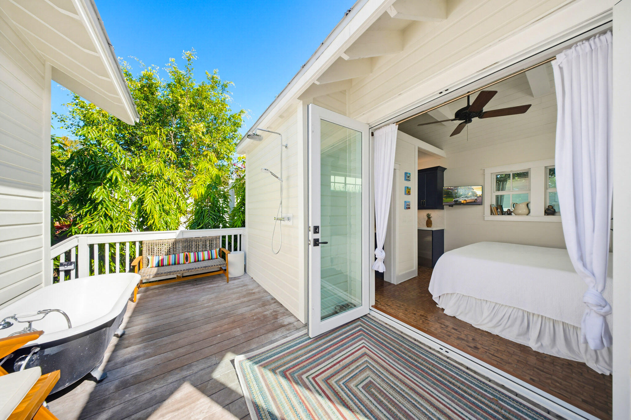 1230 South Street Key West, FL 33040 - Photo 52 of 60 a bedroom with a bed and wooden floor