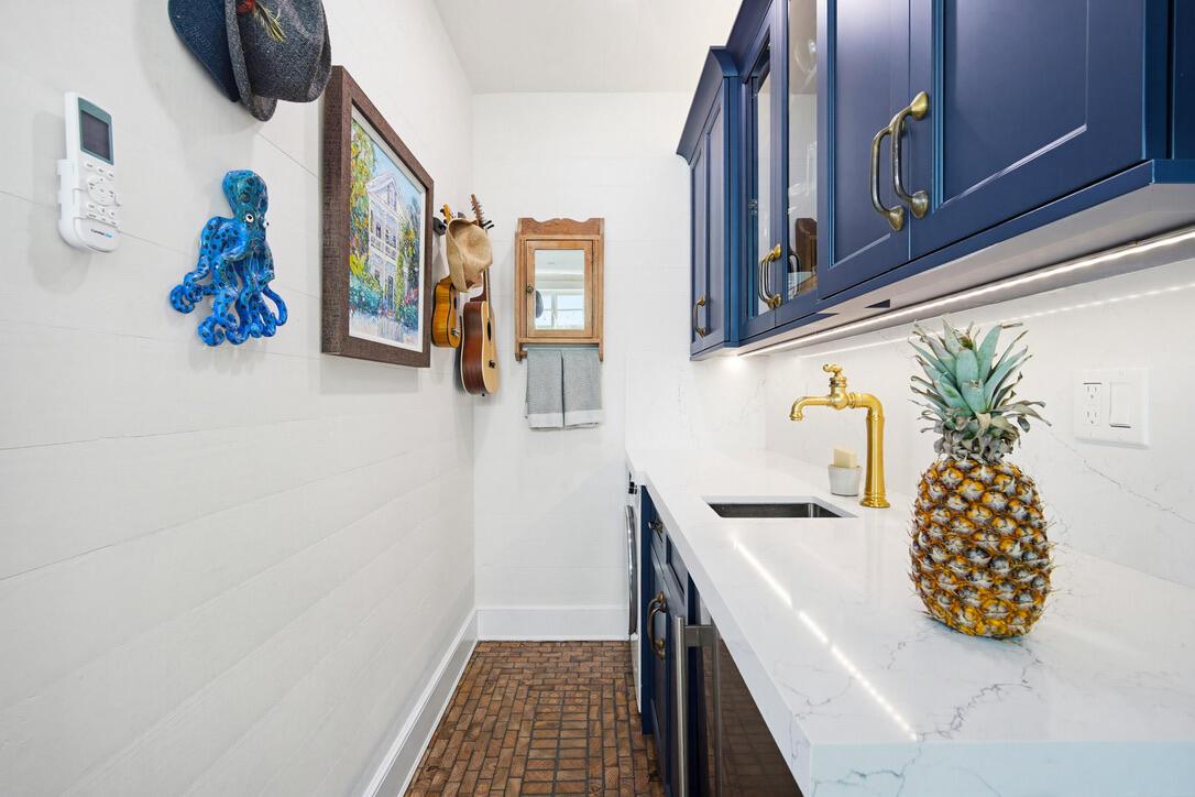 1230 South Street Key West, FL 33040 - Photo 56 of 60 a bathroom with a sink and a mirror