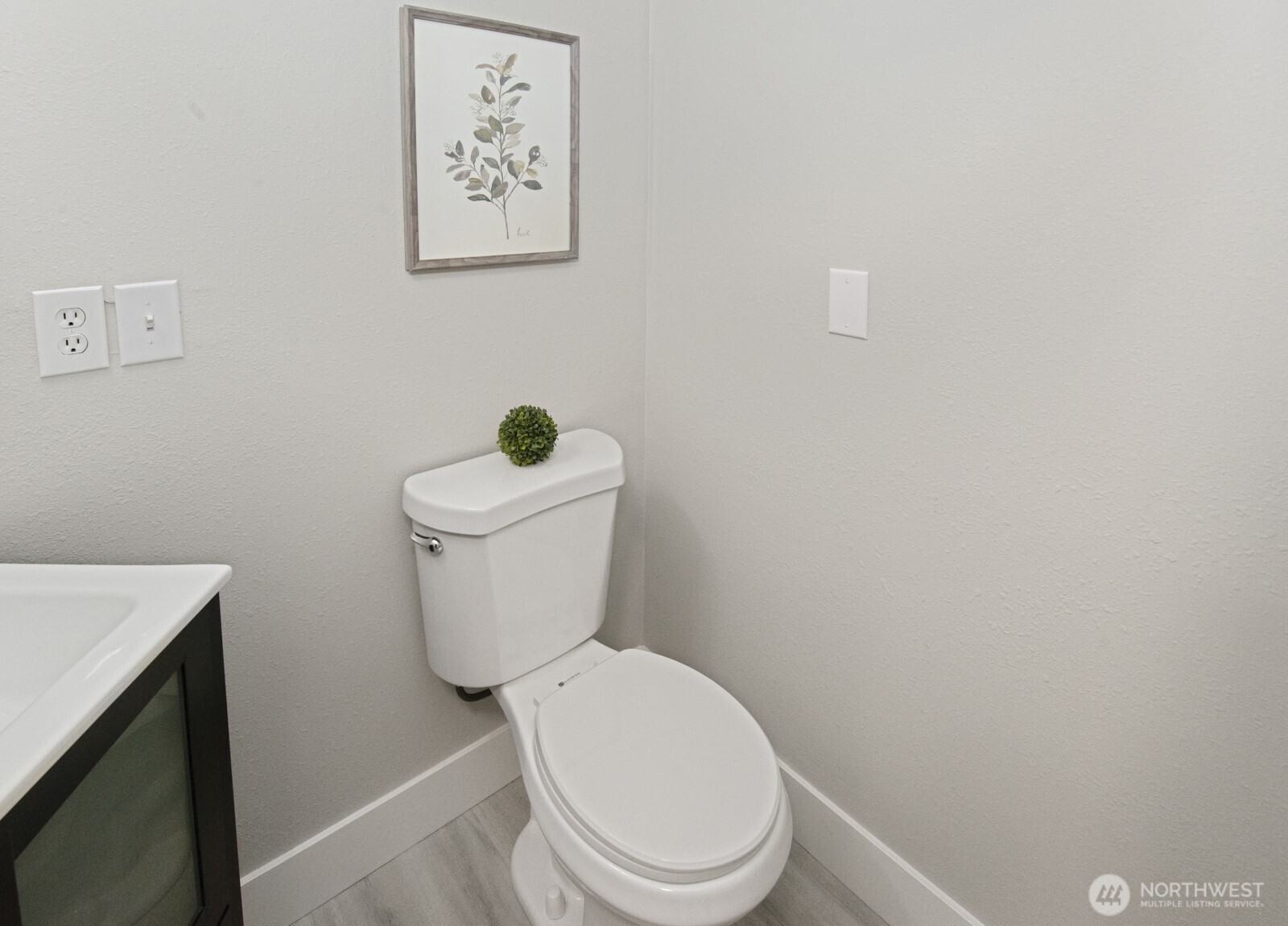 15002 Willow Road Southeast Port Orchard, WA 98367 - Photo 12 of 40 a white toilet sitting next to a white wall