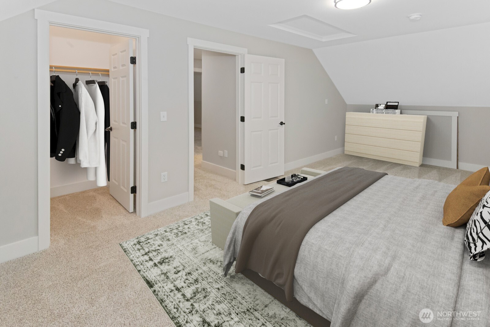 15002 Willow Road Southeast Port Orchard, WA 98367 - Photo 22 of 40 a bedroom with a bed and a mirror