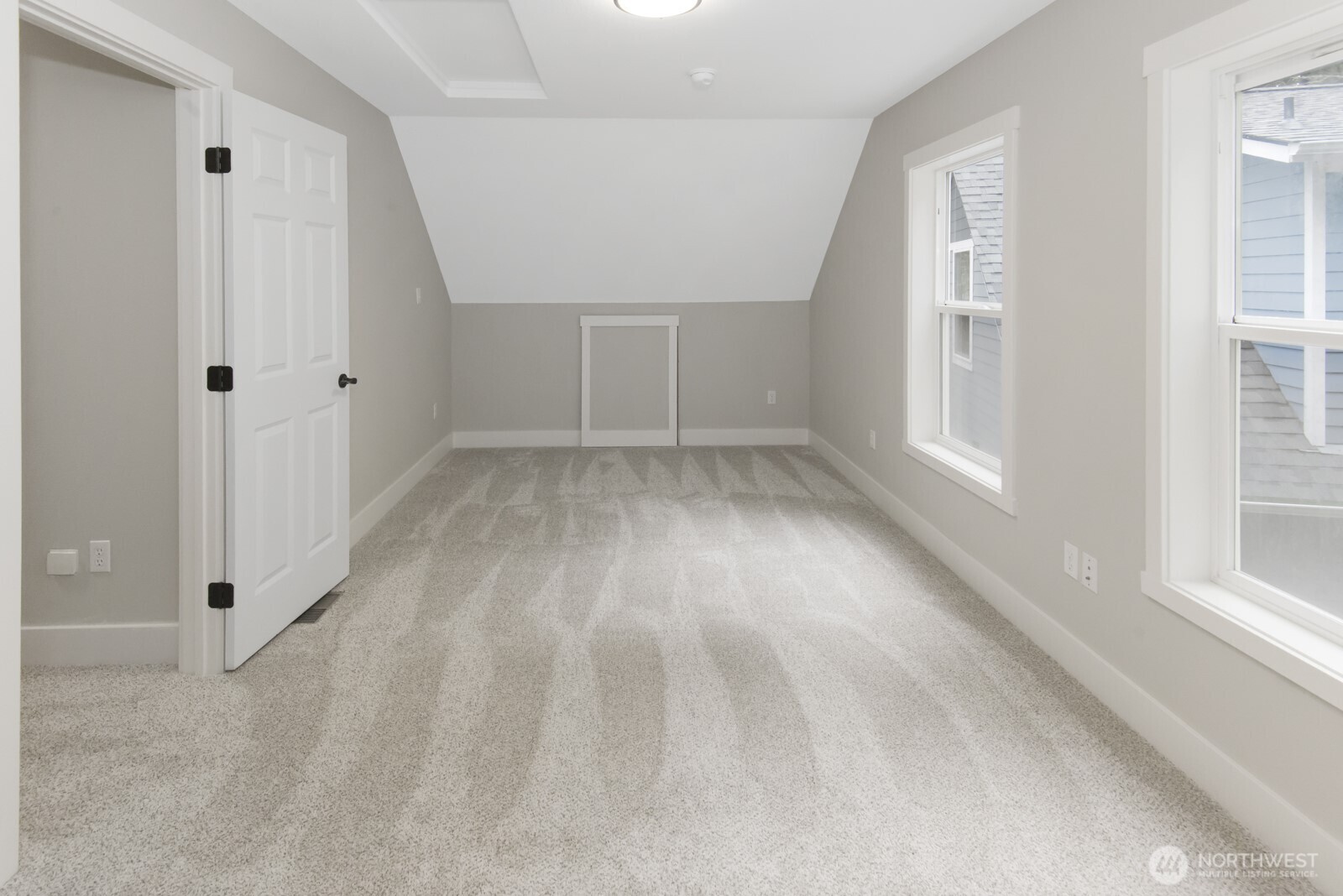 15002 Willow Road Southeast Port Orchard, WA 98367 - Photo 23 of 40 wooden floor in an empty room with a window