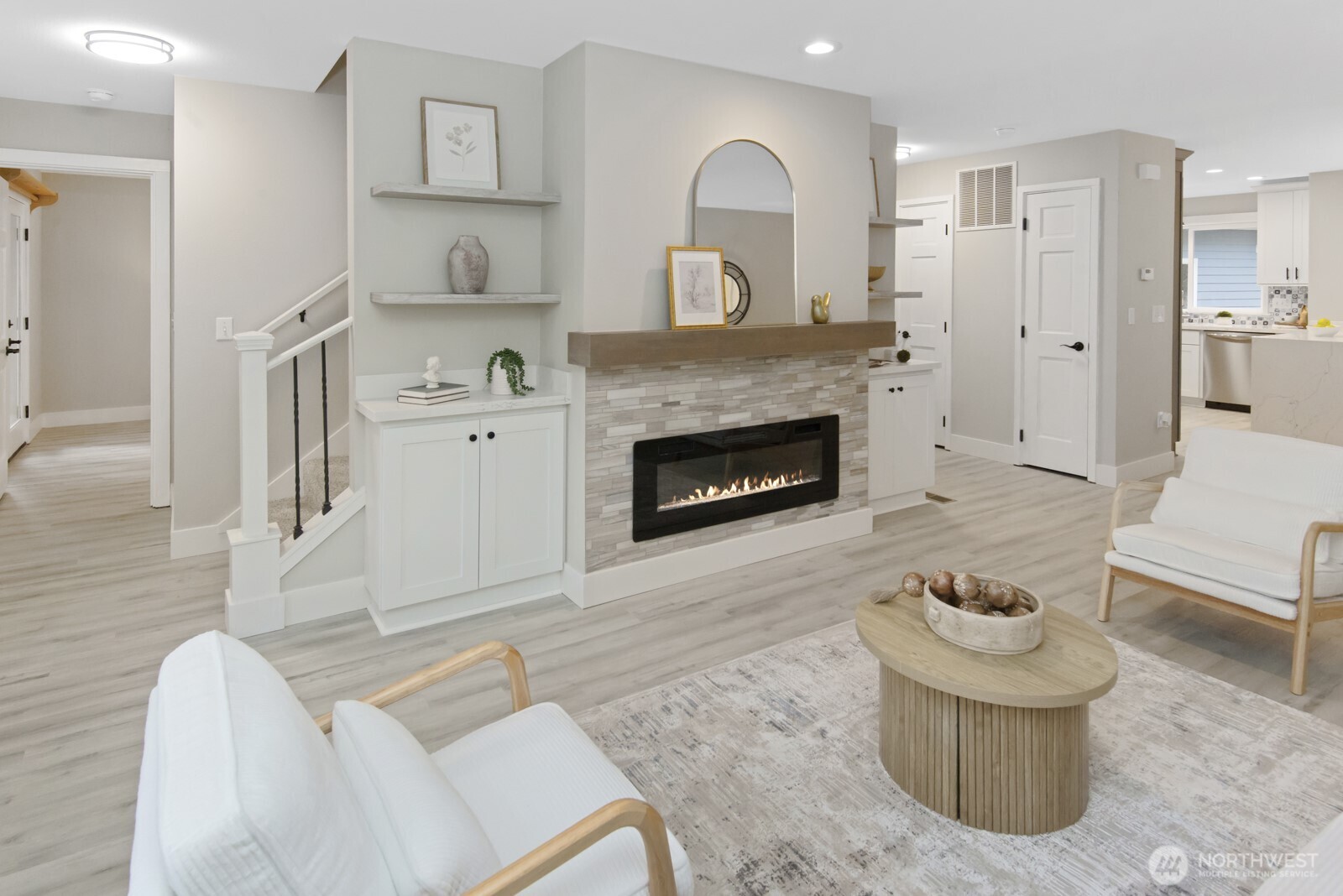 15002 Willow Road Southeast Port Orchard, WA 98367 - Photo 3 of 40 a living room with furniture and a fireplace