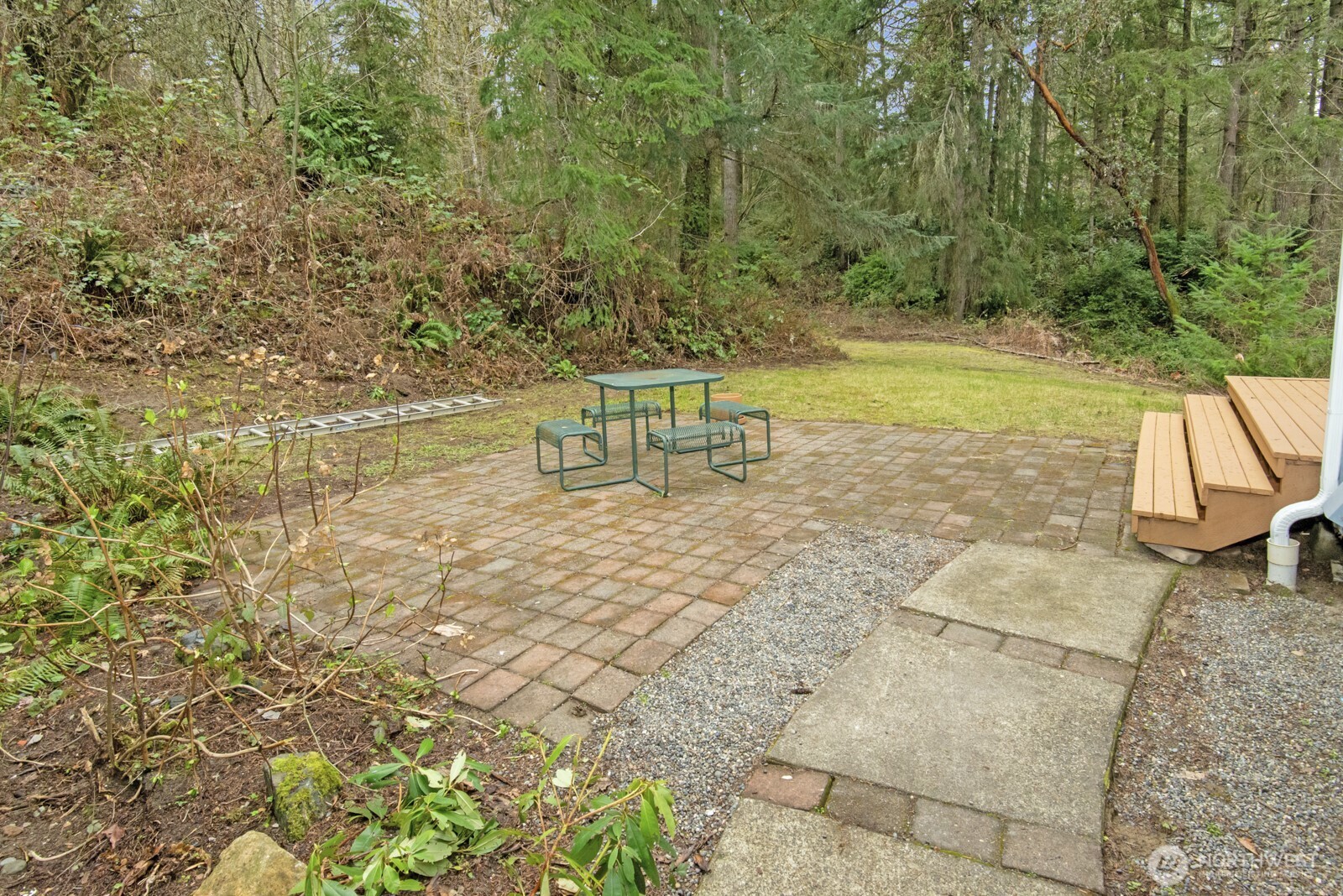 15002 Willow Road Southeast Port Orchard, WA 98367 - Photo 38 of 40 a view of a yard with an outdoor space