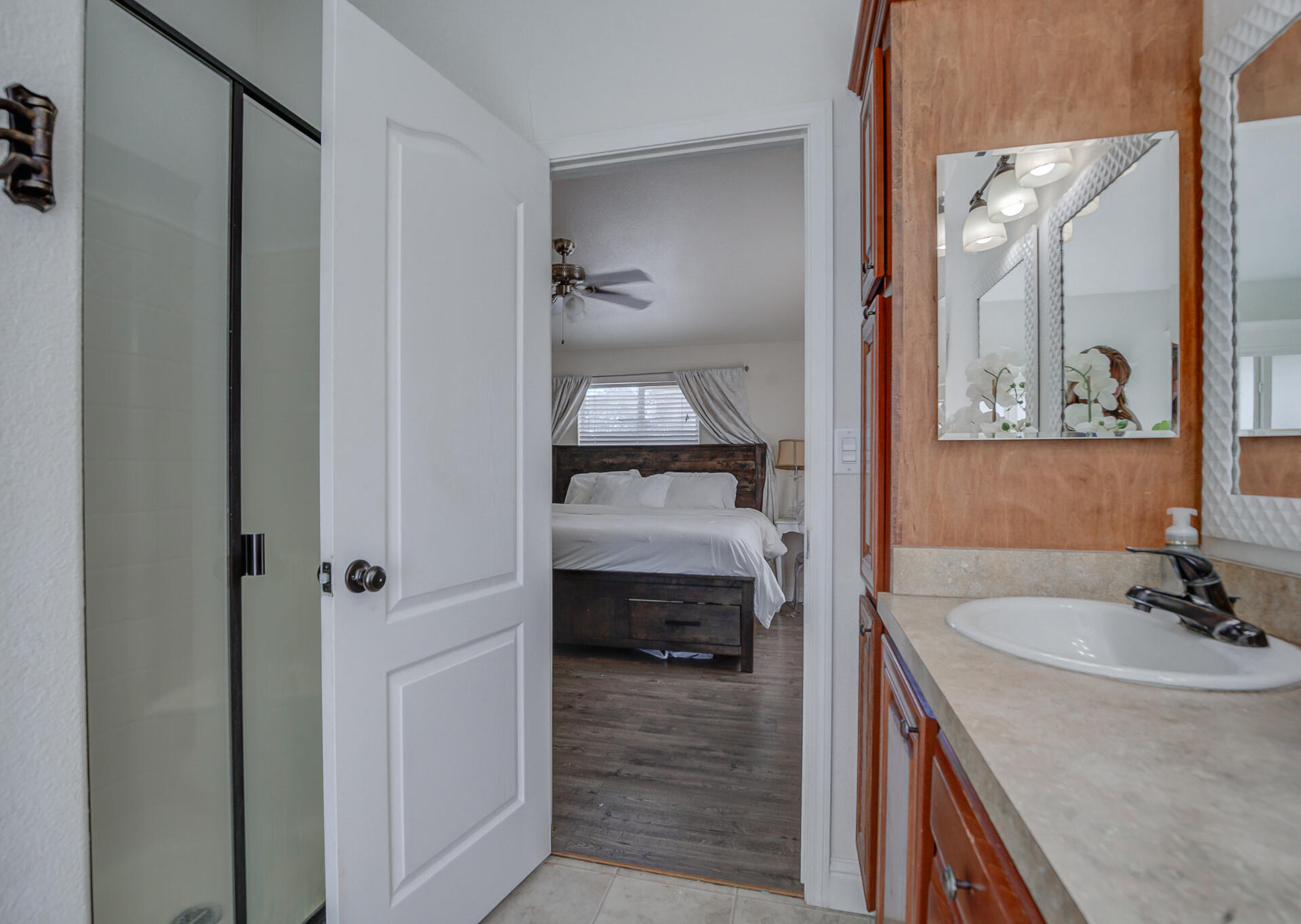 11636 Homestead Lane Redding, CA 96003 - Photo 17 of 37 a bathroom with a sink and a mirror