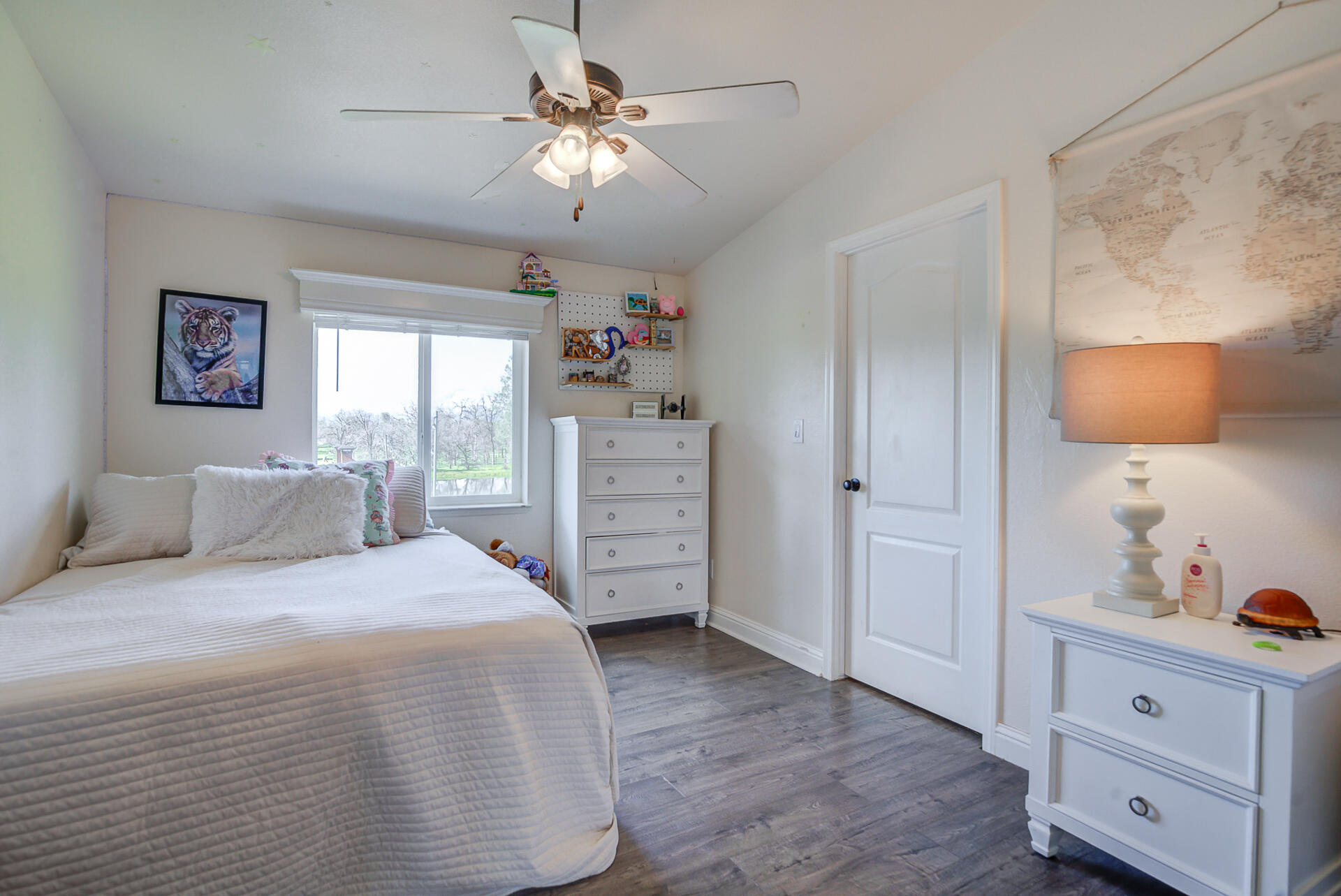 11636 Homestead Lane Redding, CA 96003 - Photo 18 of 37 a bedroom with a bed and a dresser