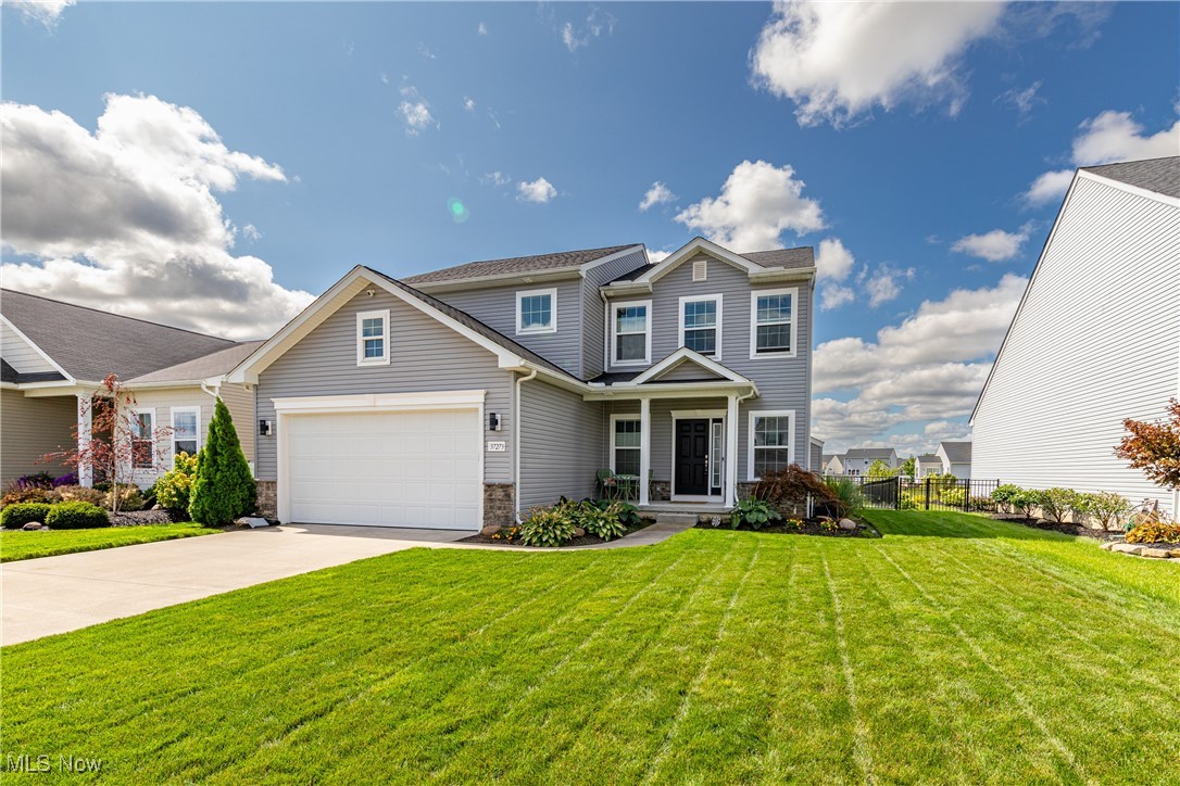 37273 Sandy Ridge Drive North Ridgeville, OH 44039 - Photo 1 of 38 View of front of property featuring a front yard