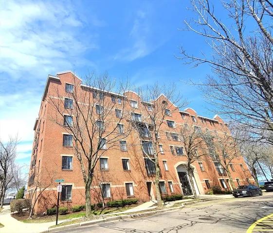 a view of a building with a street