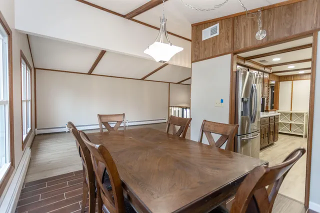 a view of a dining room with furniture