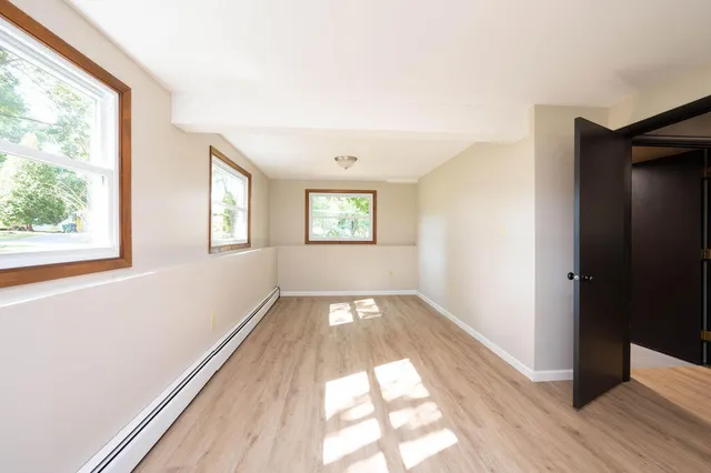 a view of an empty room and window