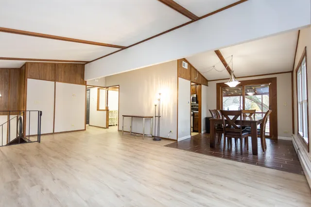 a view of a livingroom with furniture and wooden floor