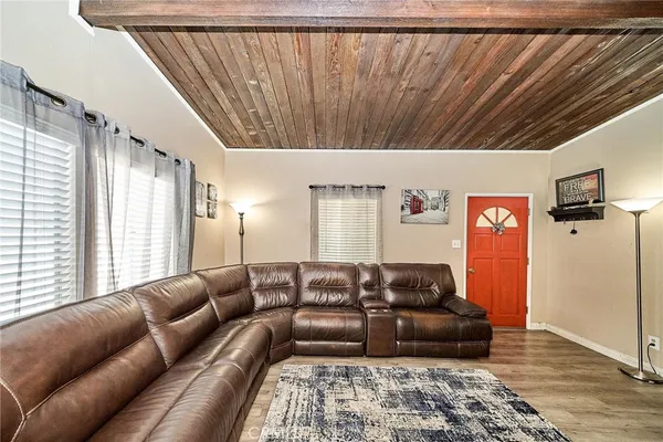 a living room with furniture and a couch