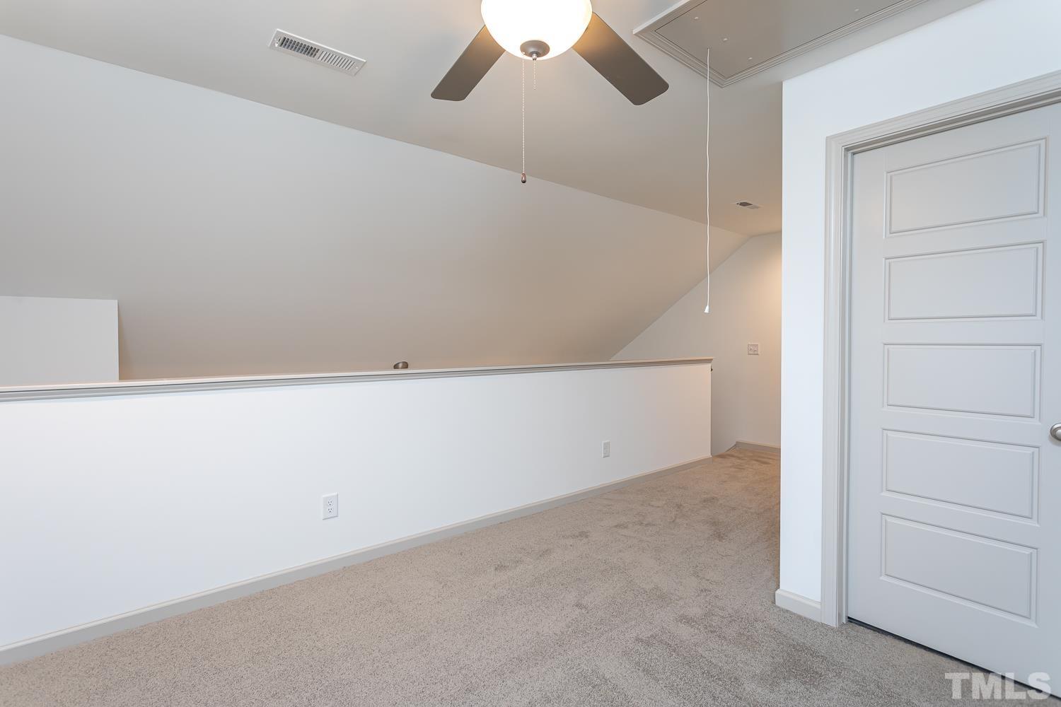 749 Hadstock Path Zebulon, NC 27597 - Photo 18 of 25 an empty room