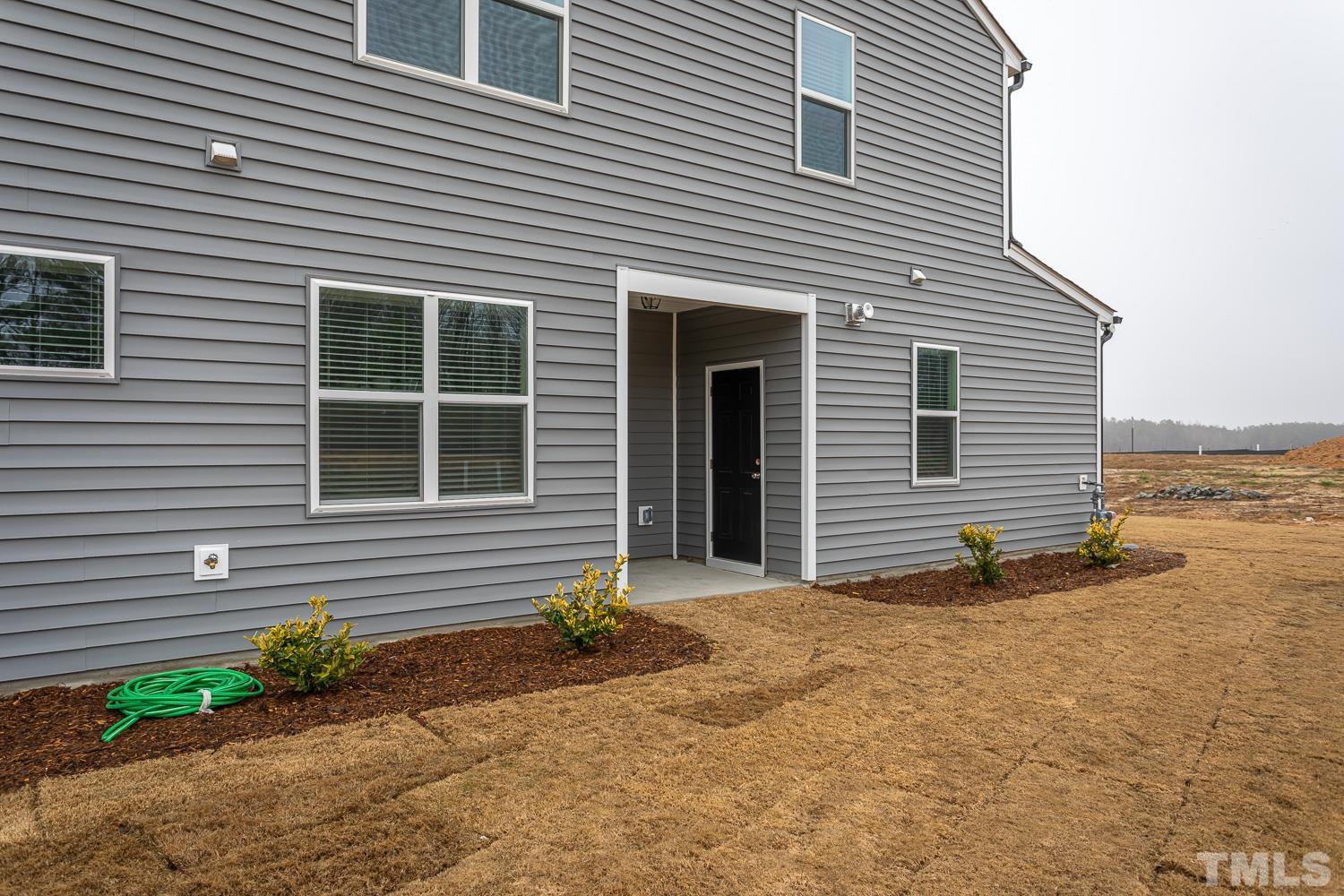 749 Hadstock Path Zebulon, NC 27597 - Photo 23 of 25 a front view of a house