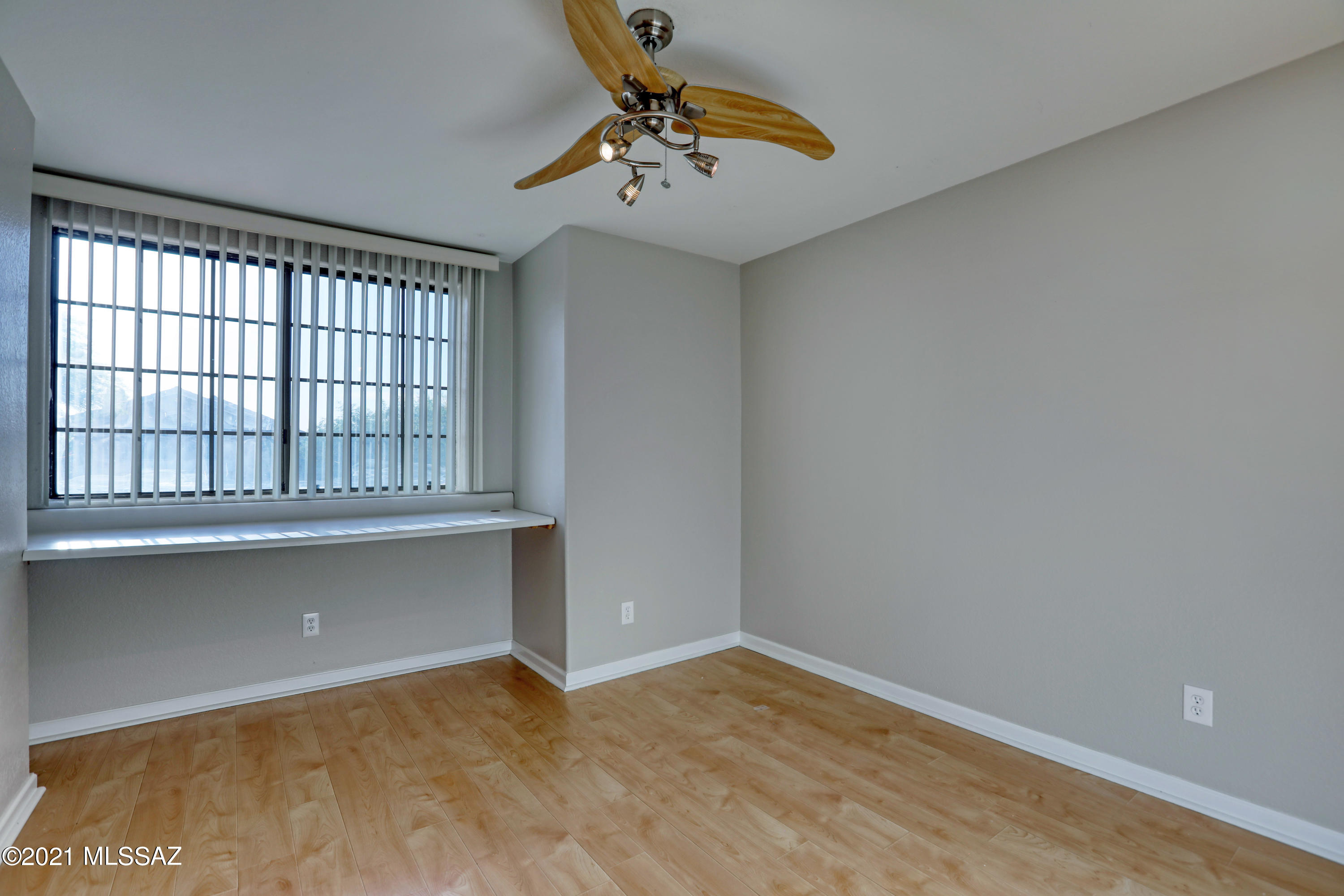 12560 North Wayfarer Way Oro Valley, AZ 85755 - Photo 38 of 43 a view of an empty room with a window