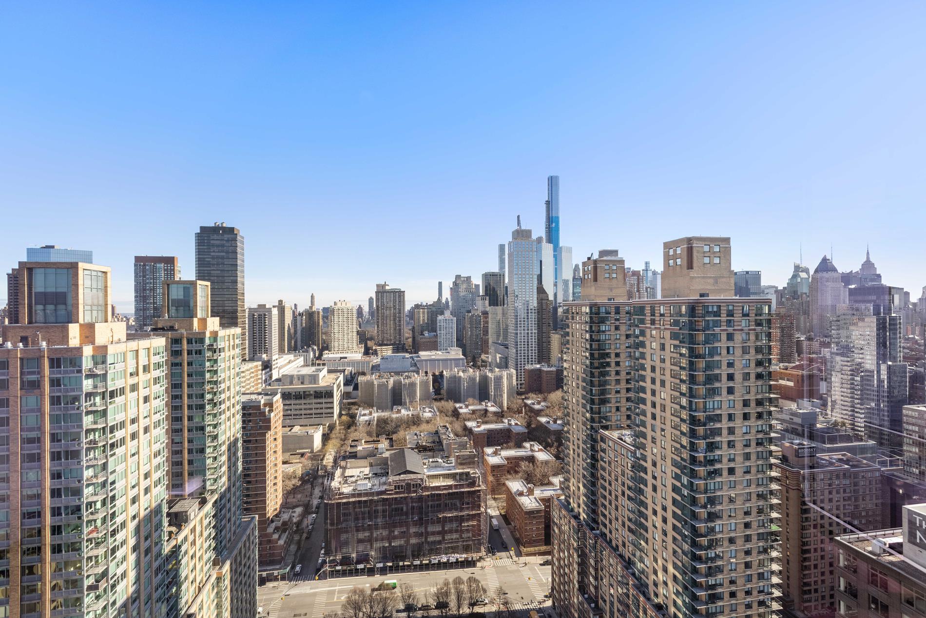 80 Riverside Boulevard, Unit 37B Manhattan, NY 10069 - Photo 7 of 22 a view of a city with tall buildings in the background
