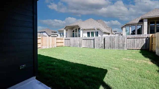a house view with a garden space