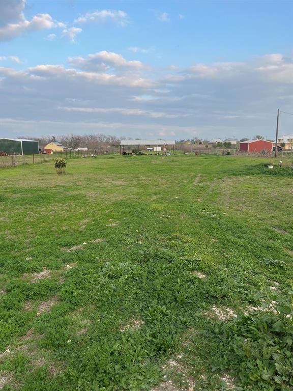 5102 Turnersville Road Creedmoor, TX 78610 - Photo 2 of 5 View of yard with a view of countryside