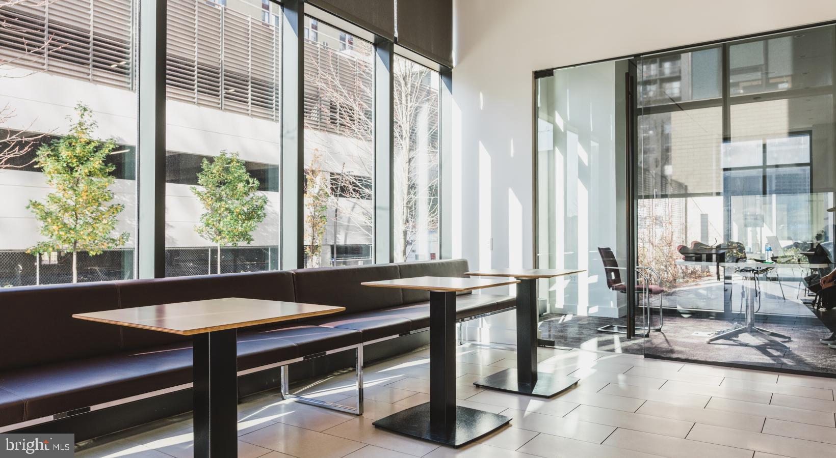 450 North 18th Street, Unit 0B1331 Philadelphia, PA 19130 - Photo 20 of 44 a view of a dining room with furniture window and outside view