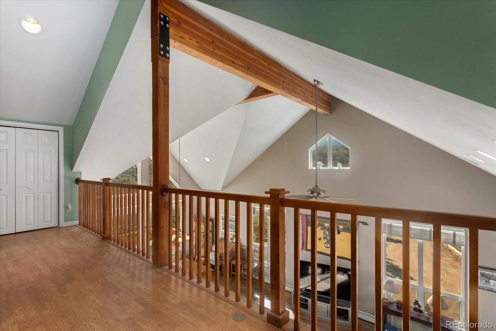 402 Trailridge Road Coaldale, CO 81222 - Photo 17 of 50 a view of staircase with railing and white walls