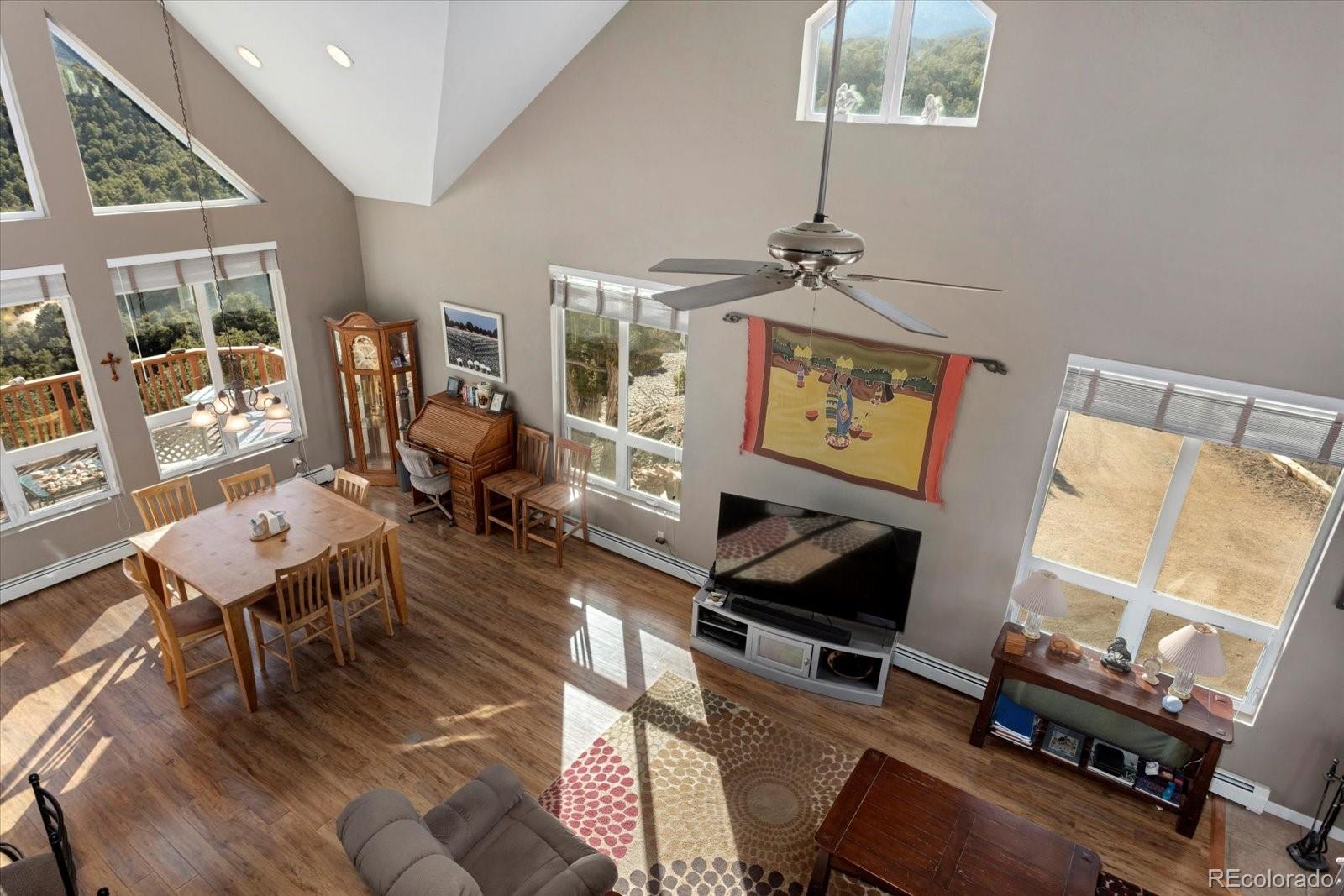 402 Trailridge Road Coaldale, CO 81222 - Photo 18 of 50 a living room with furniture a flat screen tv and a window