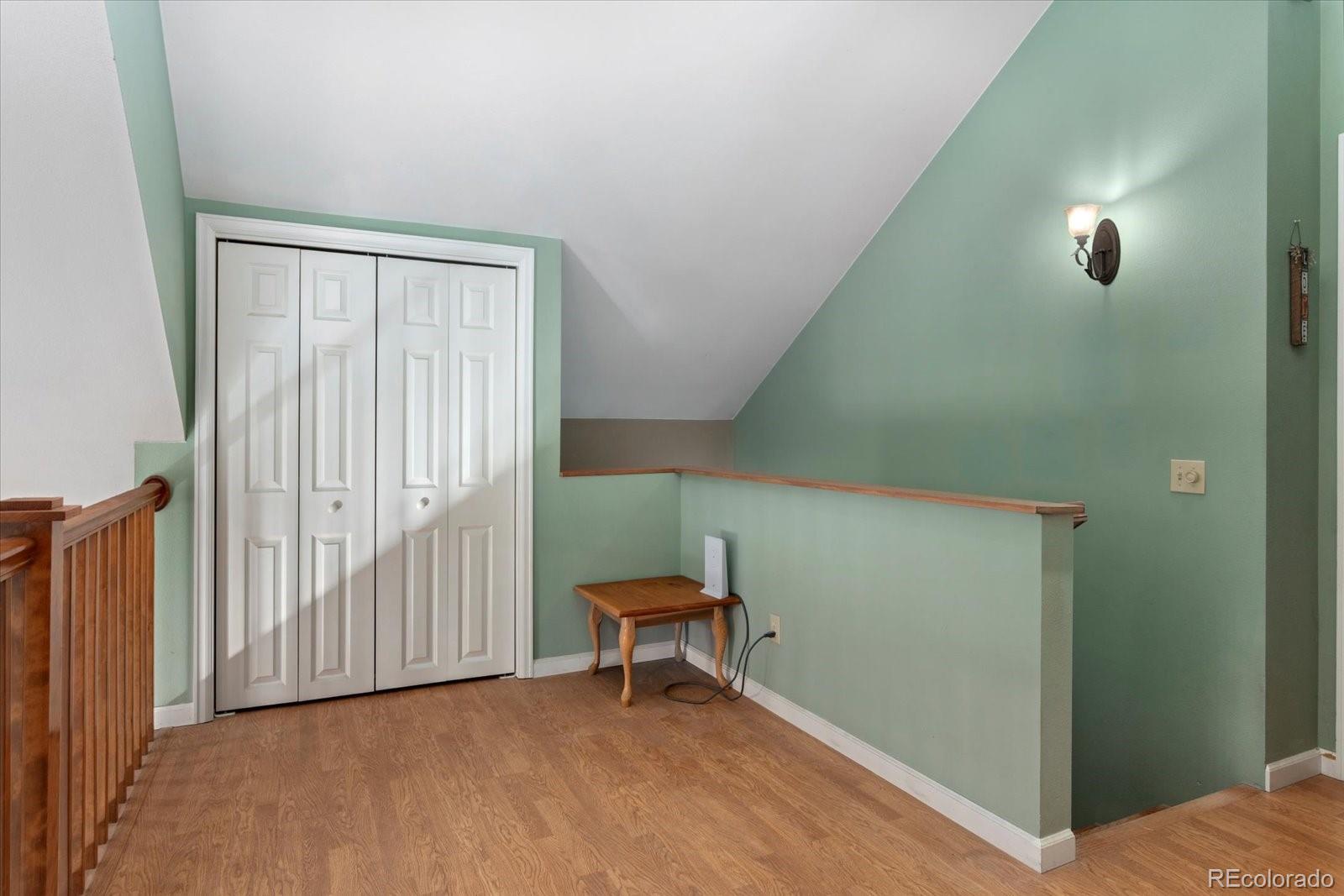 402 Trailridge Road Coaldale, CO 81222 - Photo 19 of 50 a view of a livingroom with chair and front door