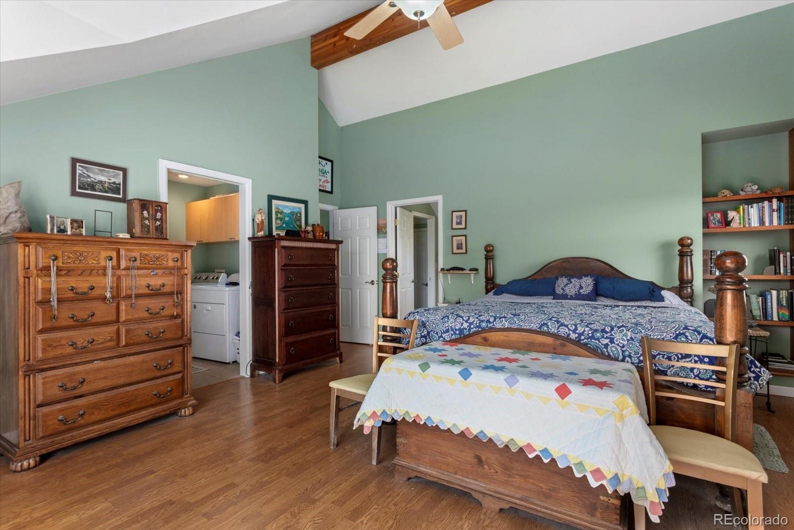 402 Trailridge Road Coaldale, CO 81222 - Photo 21 of 50 a bedroom with a bed and furniture