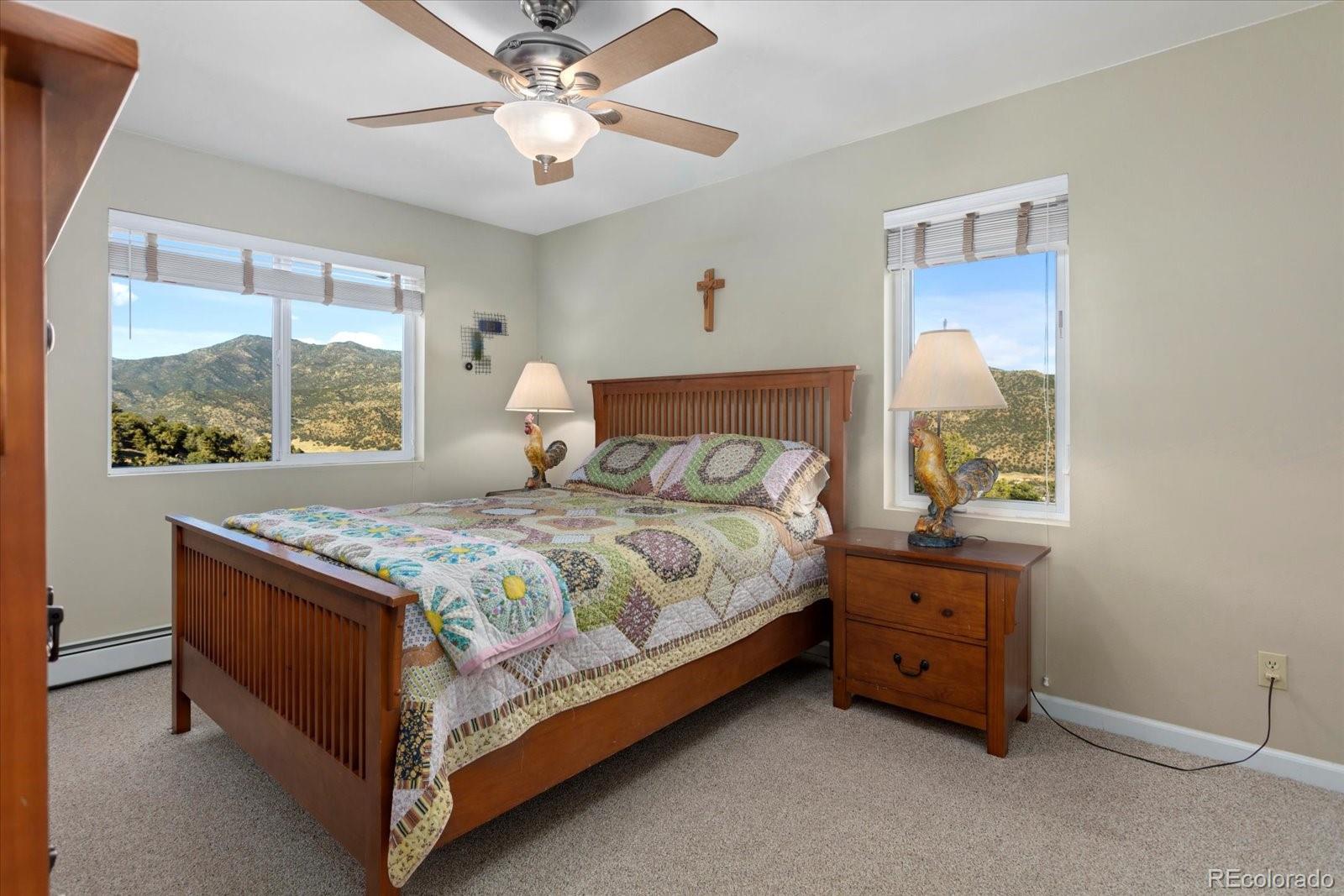 402 Trailridge Road Coaldale, CO 81222 - Photo 26 of 50 a bedroom with a bed and a window