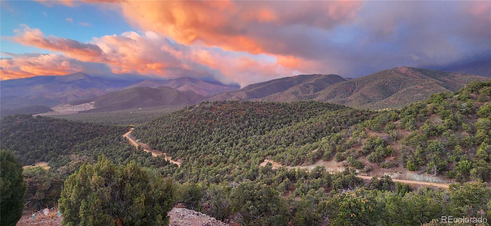 402 Trailridge Road Coaldale, CO 81222 - Photo 3 of 50 a view of a city with mountains in the background