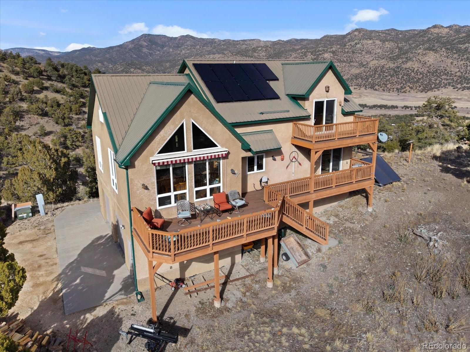 402 Trailridge Road Coaldale, CO 81222 - Photo 34 of 50 an aerial view of a house with a yard