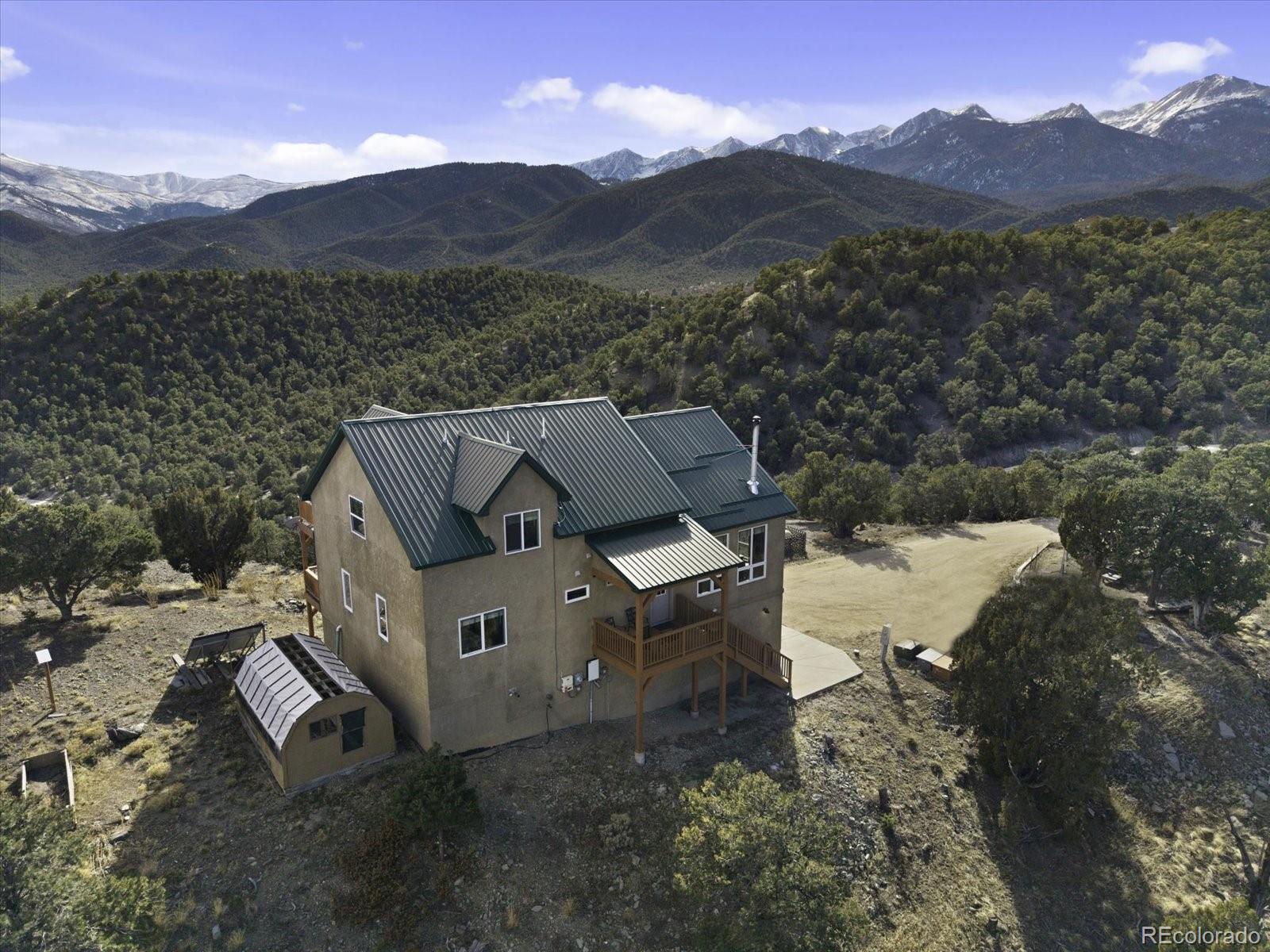 402 Trailridge Road Coaldale, CO 81222 - Photo 36 of 50 a view of a house with a mountain