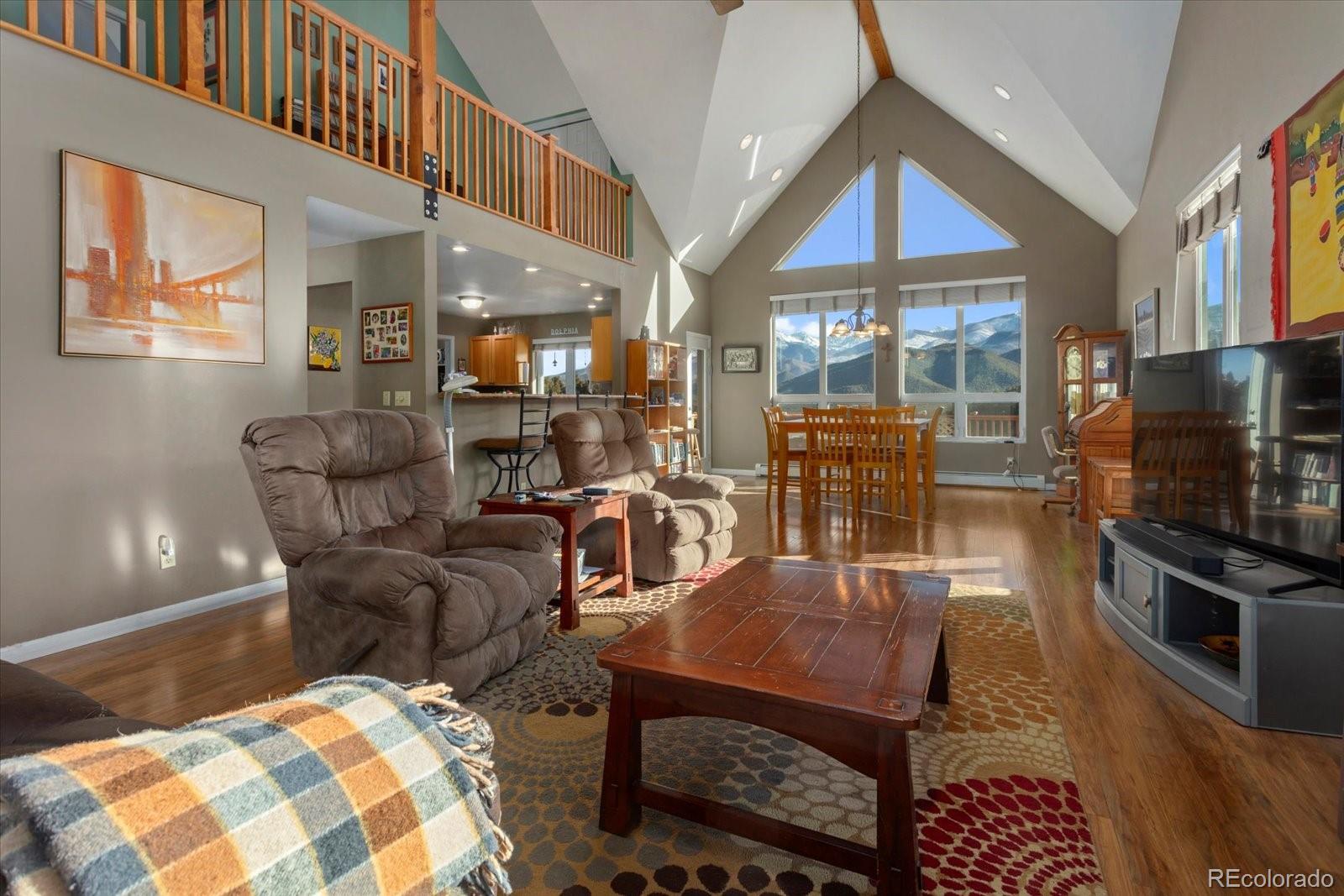 402 Trailridge Road Coaldale, CO 81222 - Photo 5 of 50 a living room with furniture and a flat screen tv